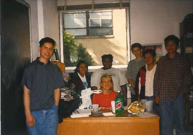 Group of student sitting around a desk